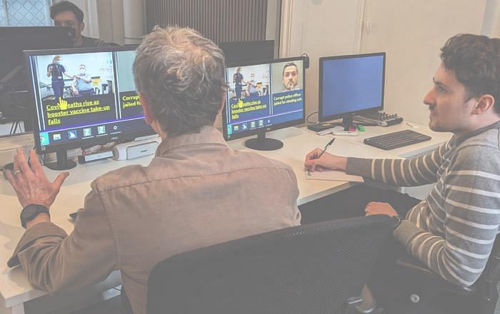 2 people in a lab envionment conducting usability testing