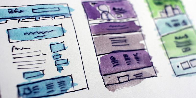 Watercolour sketches of website designs