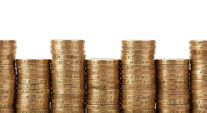 Seven stacks of one pound coins